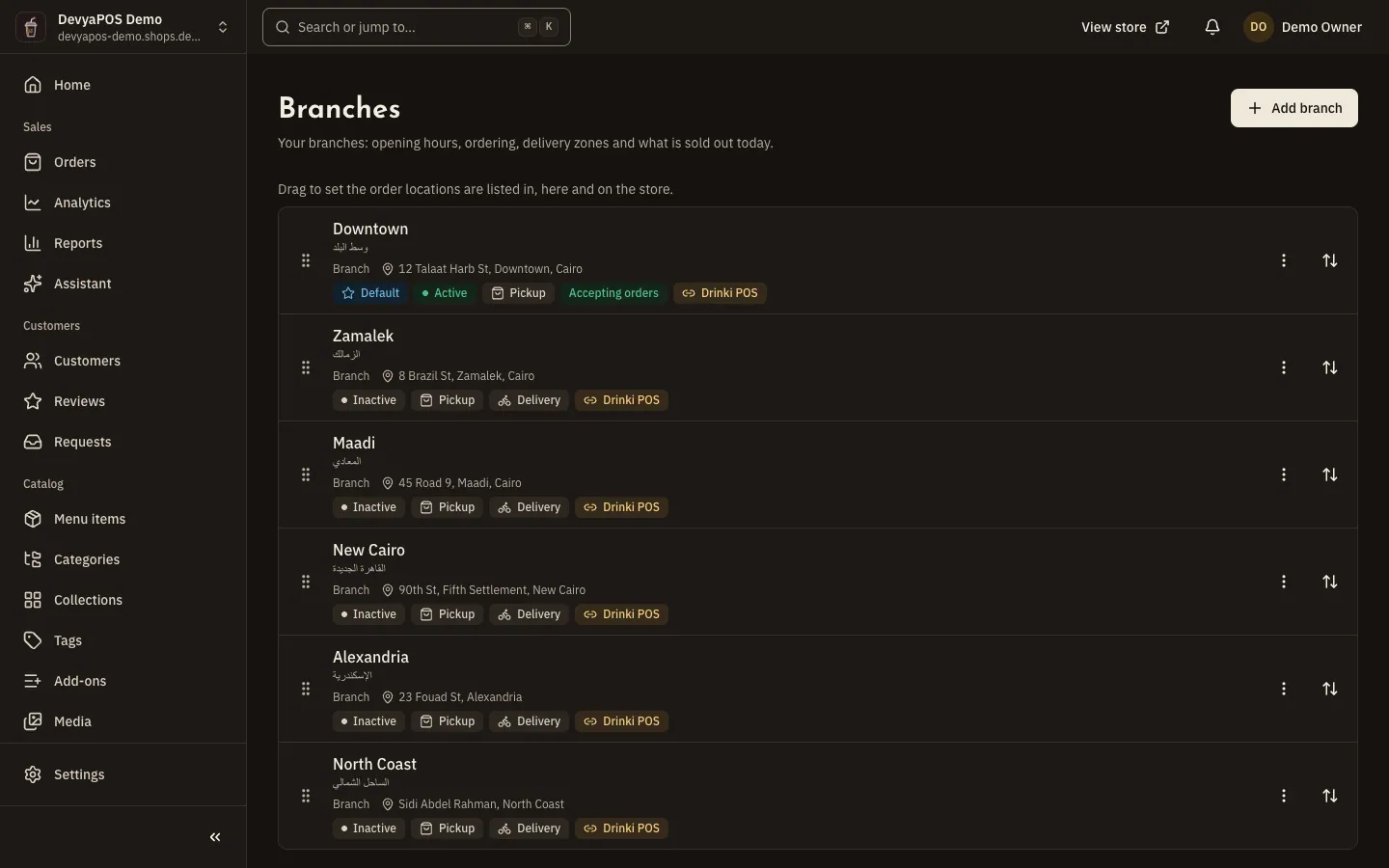 A restaurant's branch list: each branch with badges such as Default, Pickup, Delivery and Accepting orders, its delivery zone count, and an Add branch button.